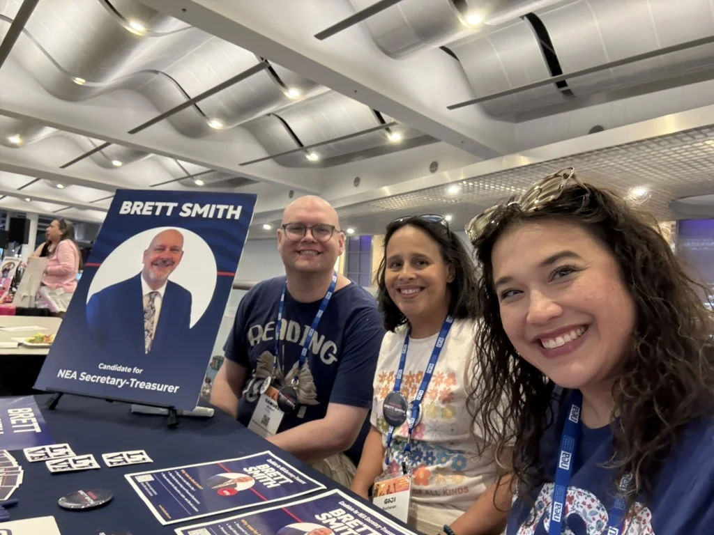 Missy and fellow volunteers at an NEA campaign table