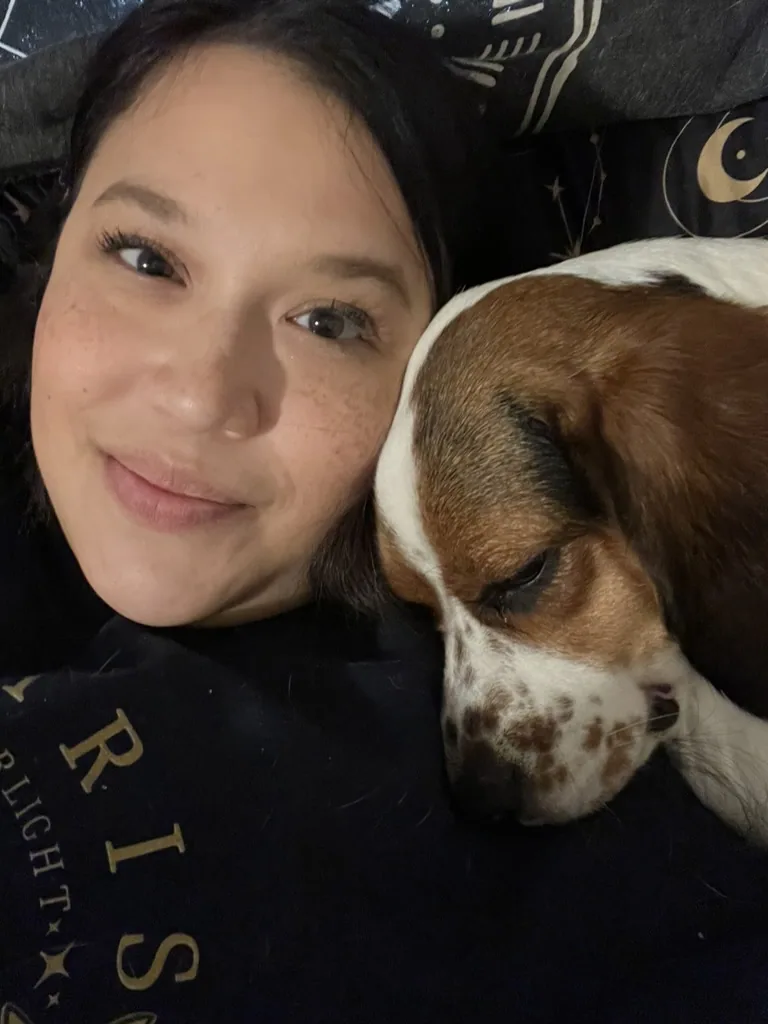 Missy alongside a resting beagle