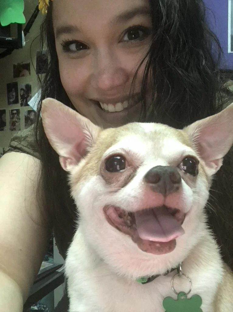 Missy with a smiling Chihuahua
